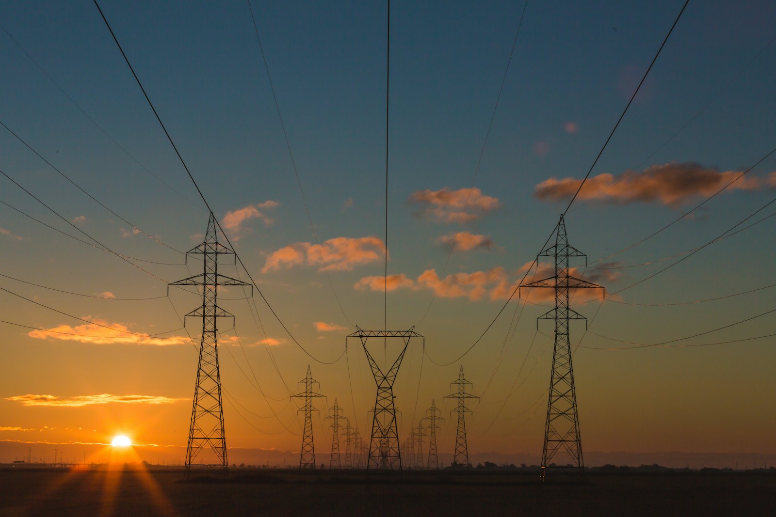 Power transmission lines at sunset